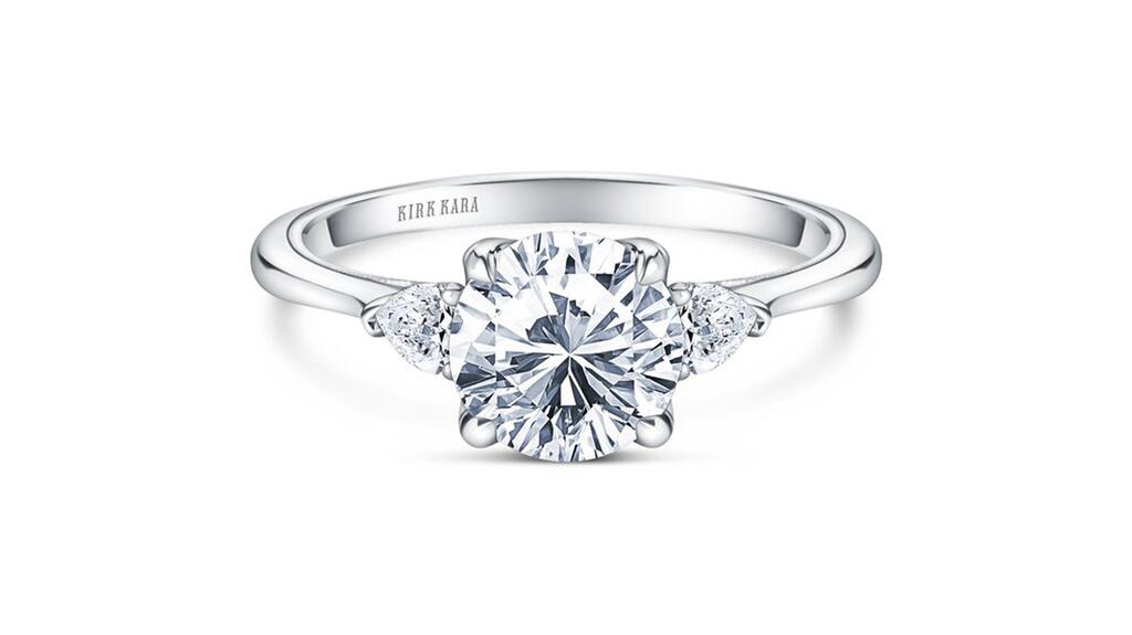 A three-stone ring from Kirk Kara’s “Stella” collection. The brand is known for its vintage-inspired engagement rings. Kirk Kara Stella engagement ring